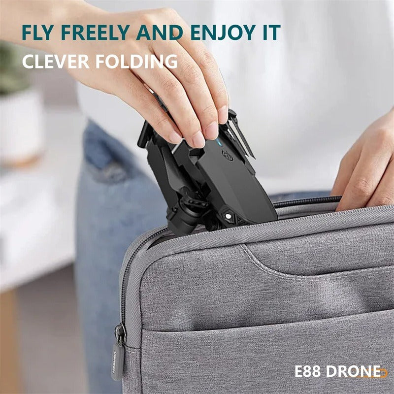 The E88 Dual-camera Drone With Two Batteries Has The Function Of Altitude Hold Mode. It Is Equipped With Dual Lenses And Can Fly Stably.